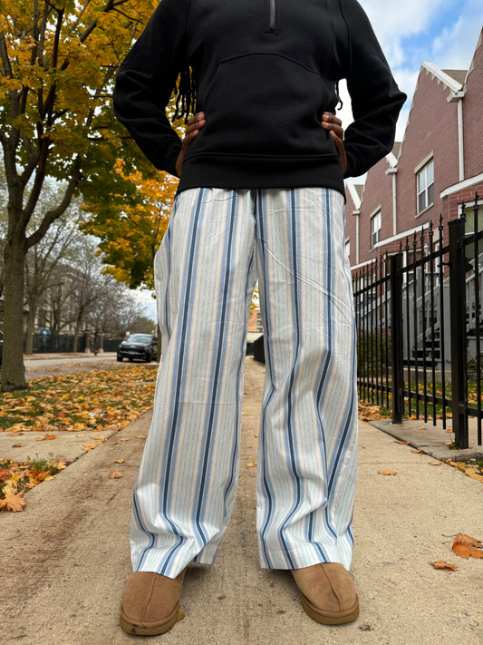 Blue striped cotton lounge pants with silver detailing by Lola’s Digicam, styled for elevated loungewear.