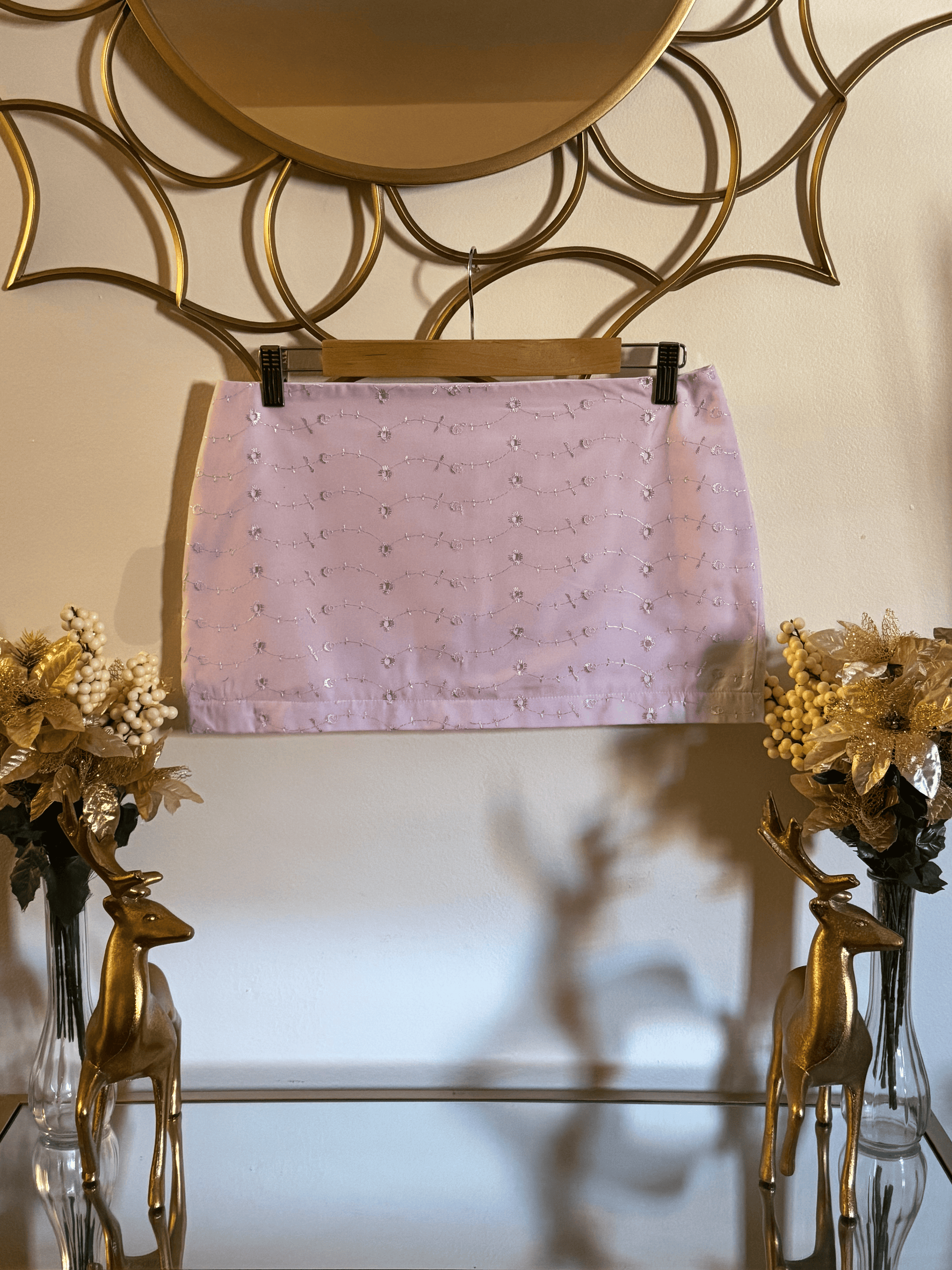 Lilac embroidered eyelet mini skirt by Lola’s Digicam, perfect for spring fashion and coastal dressing.