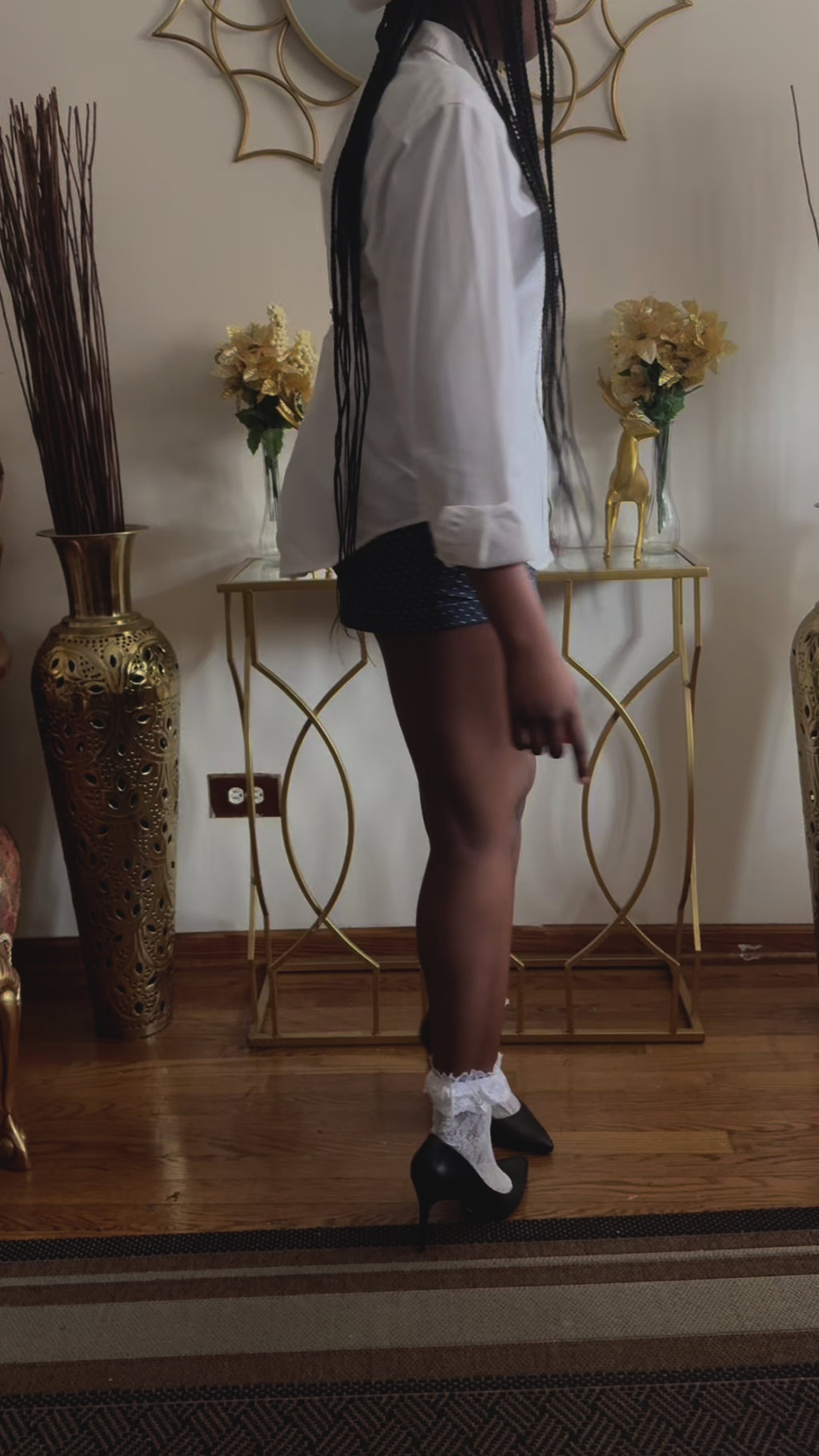 Model in Parisian-inspired navy mini skirt, a timeless piece for romantic wardrobes.